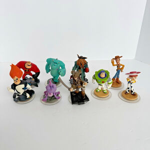 Disney Infinity Figures Lot of 9 Toy Story Pirates Monsters Inc Incredibles VGUC